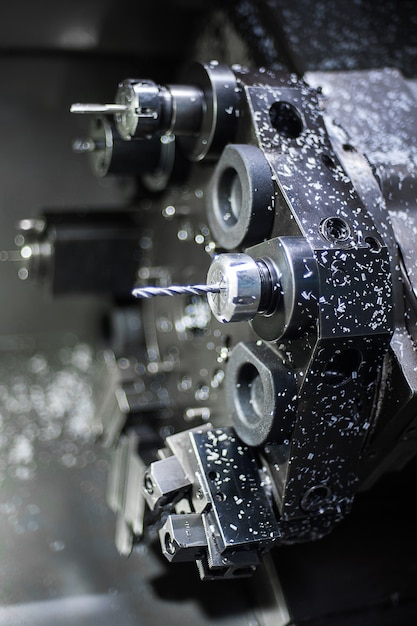 The CNC lathe machine. The hi-technology machining concept.