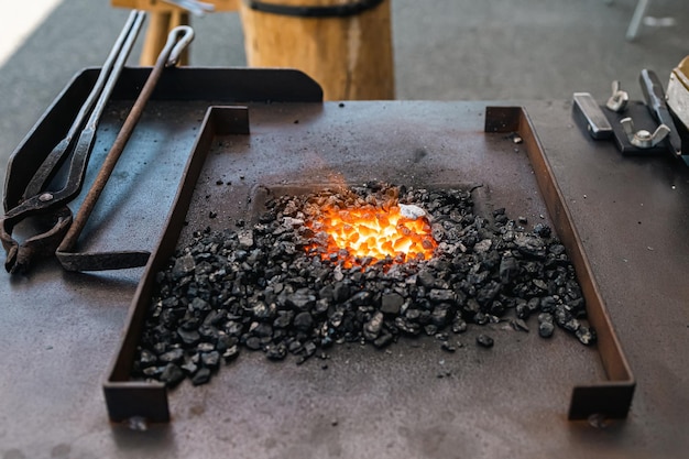 Coal burns in the forge