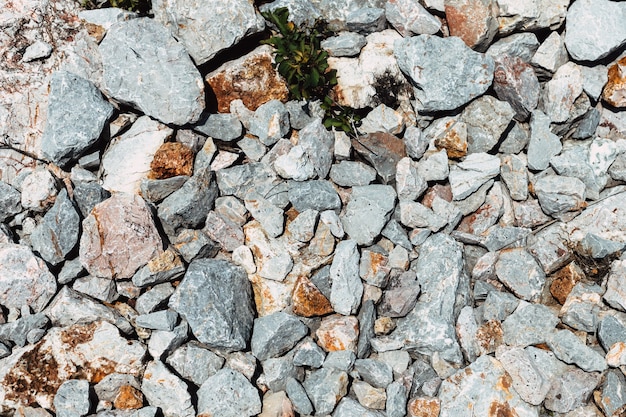 Coarse grinding granite rock stone on the ground