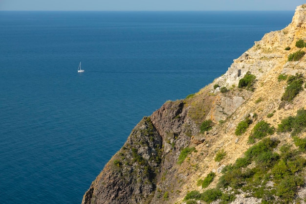 Coastal sea rocks View of the sea cliffs sea and sky from a height High quality photo