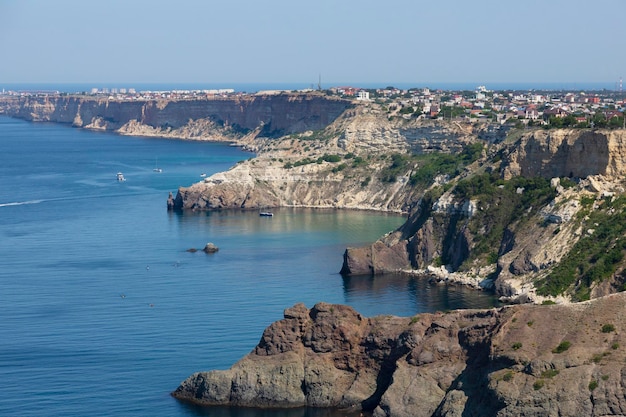 Coastal sea rocks View of the sea cliffs sea and sky from a height High quality photo