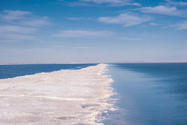 Coastal spit photo. Salt lake landscape. The relief of the sea.