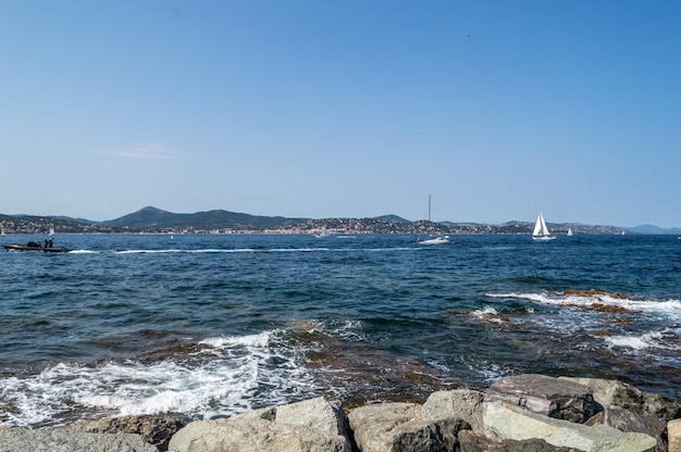 Coastline and sea surf on a sunny day, Cote d'Azur, France