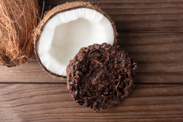 Photo cocada coconut candy on rustic wood background.