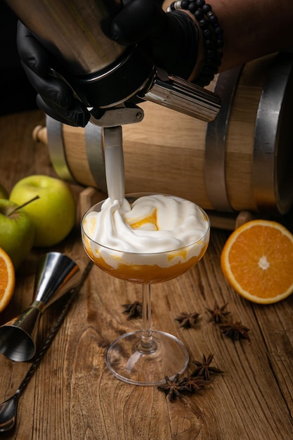 the cocktail is prepared by the bartender in the restaurant