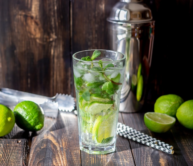 Cocktail mojito with lime, mint and ice. Recipe. Alcohol. Summer drink.