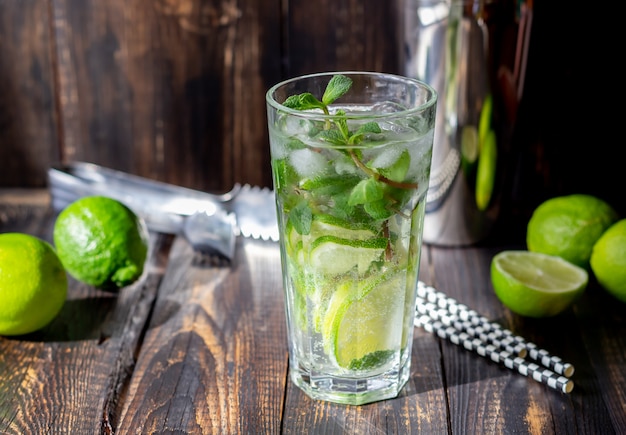 Cocktail mojito with lime, mint and ice. Recipe. Alcohol. Summer drink.