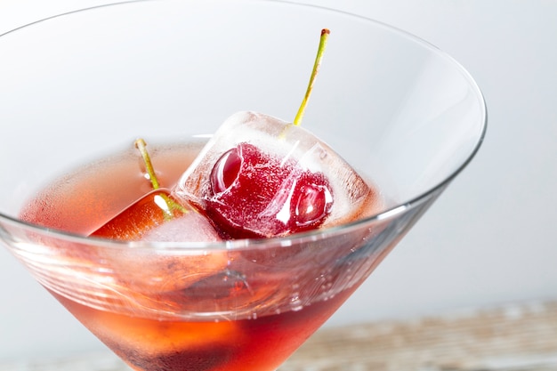 Cocktail with frozen cherries