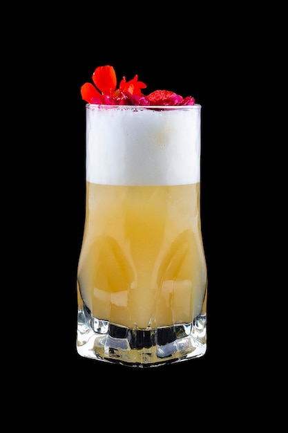 Cocktail with whiskey and pineapple juice on a dark background Isolated