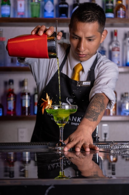 cocktails at a bar counter.