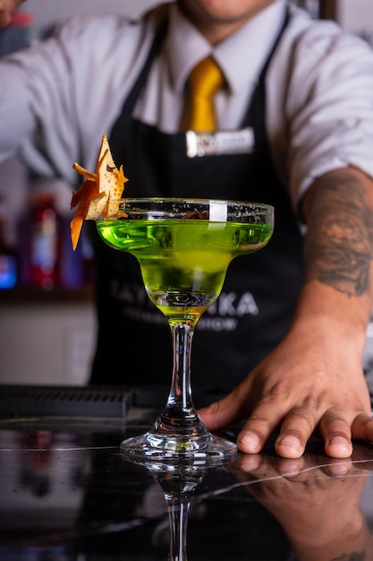 cocktails at a bar counter.