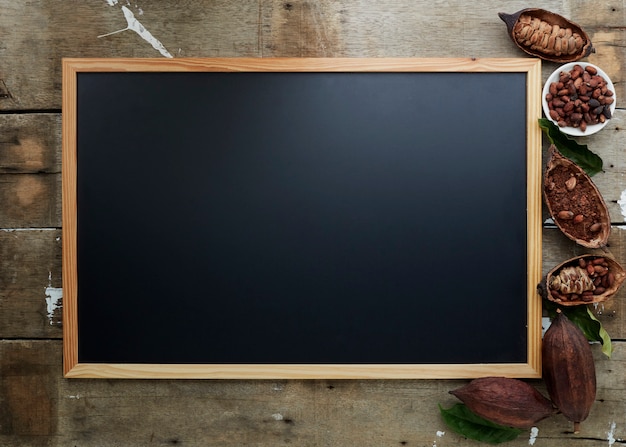 Photo cocoa beans and blank frame