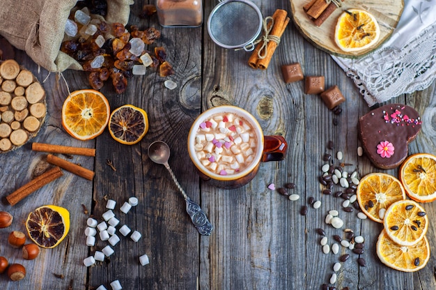 Cocoa with marshmallows and an iron spoon