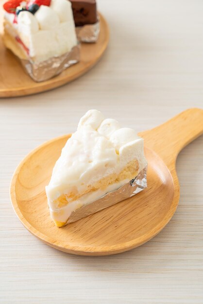 Coconut cake on wood plate