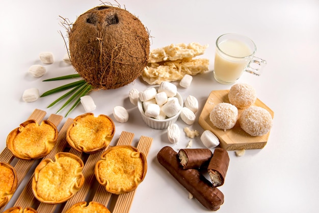 Coconut delights on a white background coconut candy baijinho and cocada