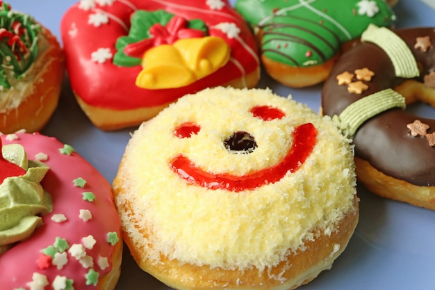 Coconut Flakes Happy Face Sweets with Another Colorful Festive Decorated Doughnuts