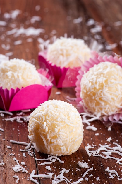 Photo coconut gourmet brigadeiro. typical brazilian sweet.