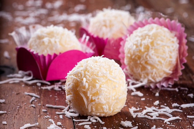 Photo coconut gourmet brigadeiro. typical brazilian sweet.