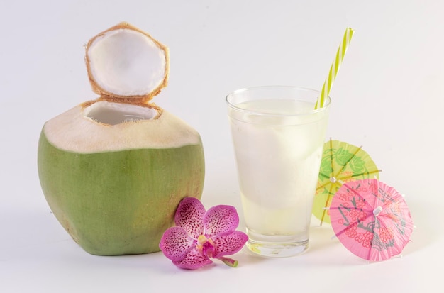 Coconut juice with fresh young coconut fruit isolated on white background