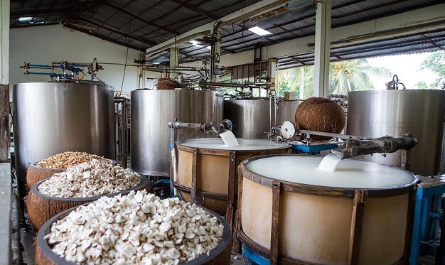 Photo a coconut milk processing section with large vats