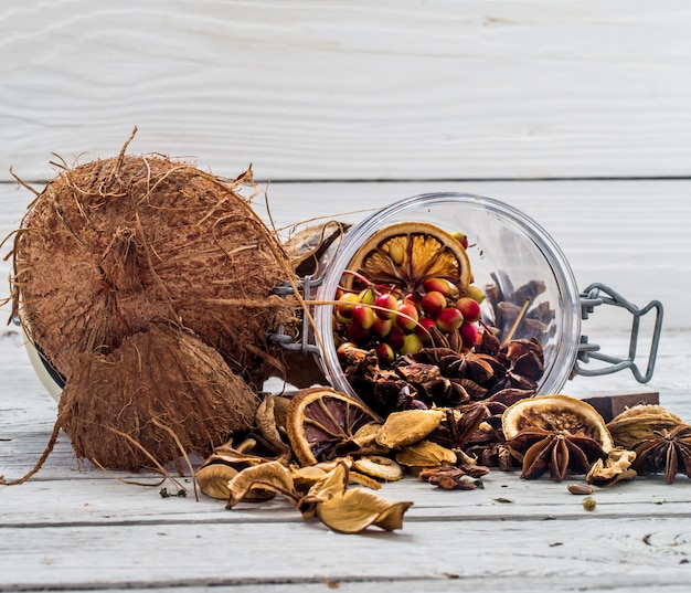 coconut whole nuts scattered shavings of on wooden background