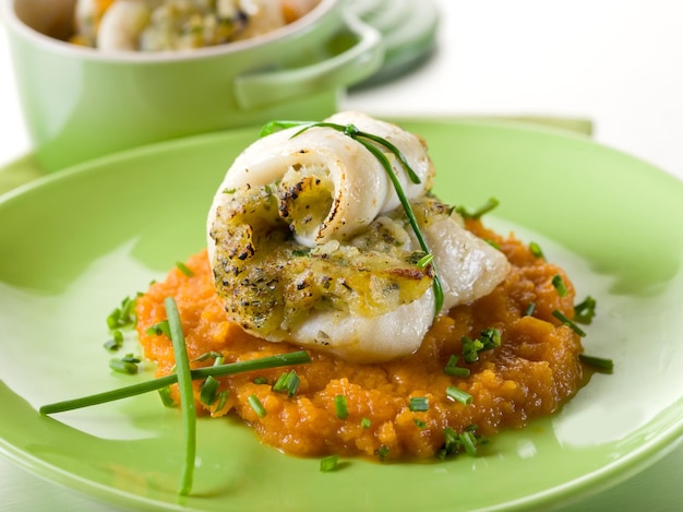 Cod fillet stuffed with herbs over mashed carrotheatlhy food