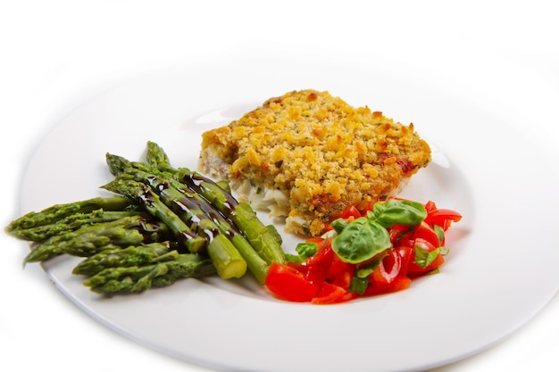 Cod fish with crispy breadcrumbs and asparagus