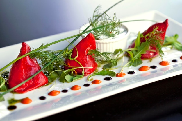 Cod and peppers on a plate