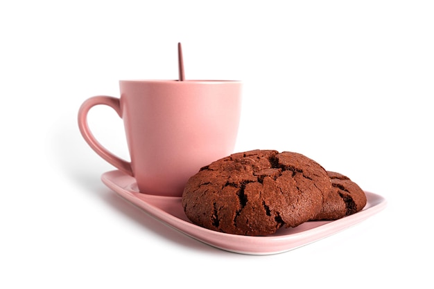 Coffee americano in cup and saucer isolated on a white background. Hot coffee with foam. Coffee with chocolate cookie. High quality photo