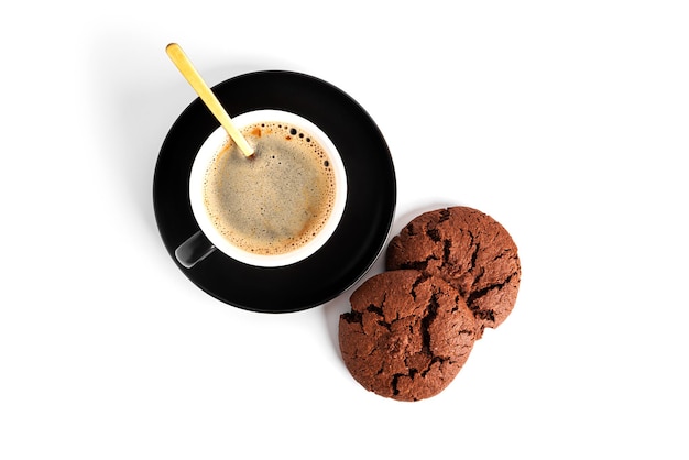 Coffee americano in cup and saucer isolated on a white background. Hot coffee with foam. Coffee with chocolate cookie. High quality photo