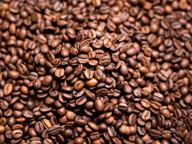 Coffee Background. roasted coffee beans, top view, Represent breakfast