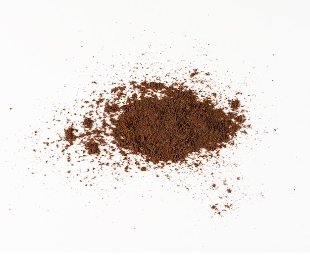 Coffee bean powder isolated on white