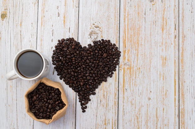 Coffee beans arranged in a heart shape