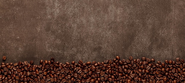 Coffee beans on background with vintage stone texture