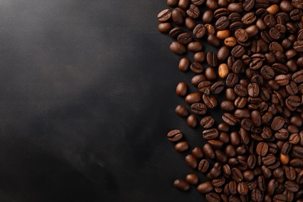 Coffee beans on a black background with copy space Top view