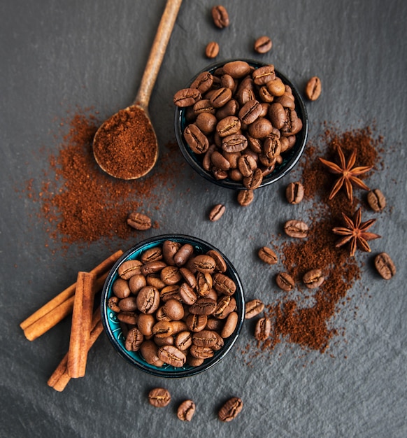 Coffee beans on a black surface