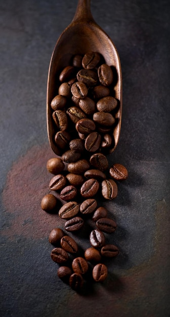 Coffee beans in closeup on graphite background