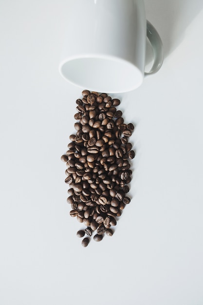 Coffee beans in coffee cup