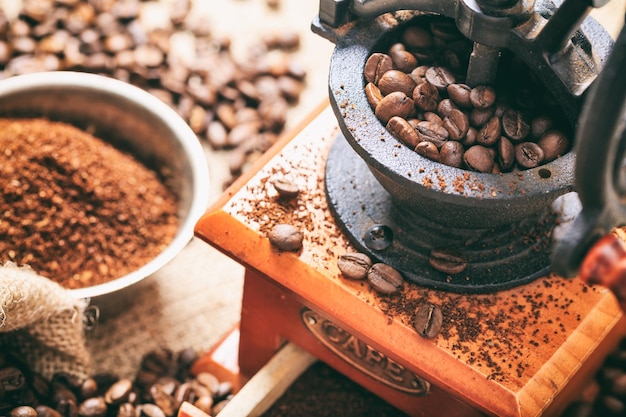 Coffee beans and a coffee grinder