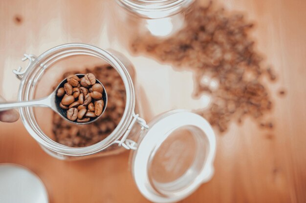 Photo coffee beans and coffee slice spoons