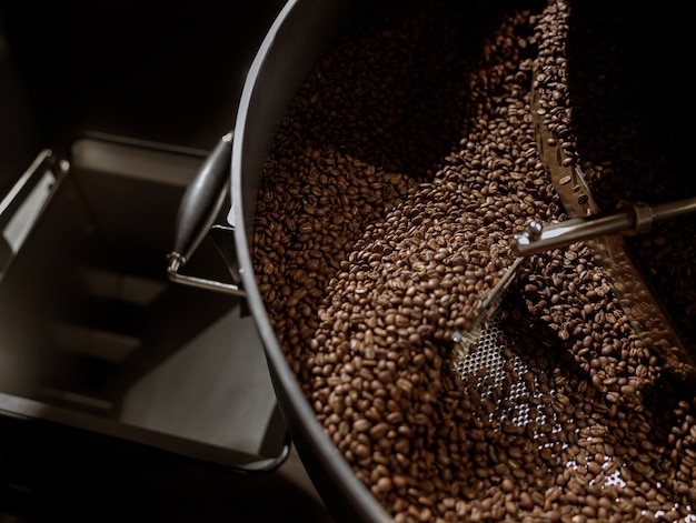 Coffee beans in cooling tray of coffee roasting machine