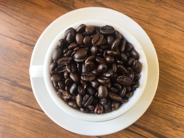 Coffee beans in a cup