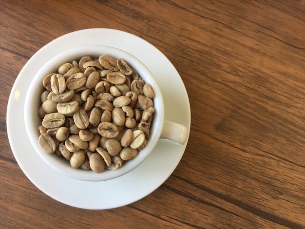 Coffee beans in a cup