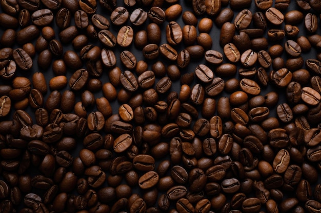 Coffee beans on a dark background can be used as a background