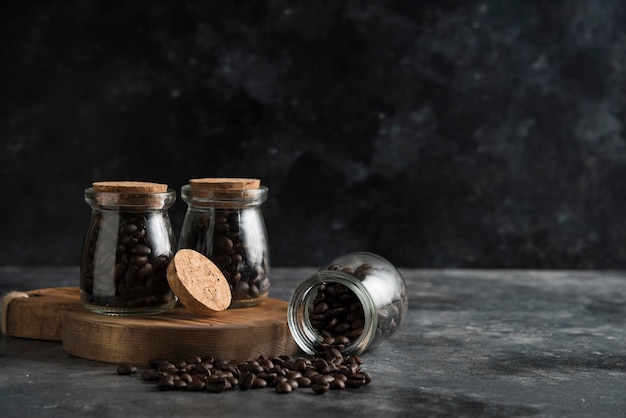 Coffee beans dark backround on wood