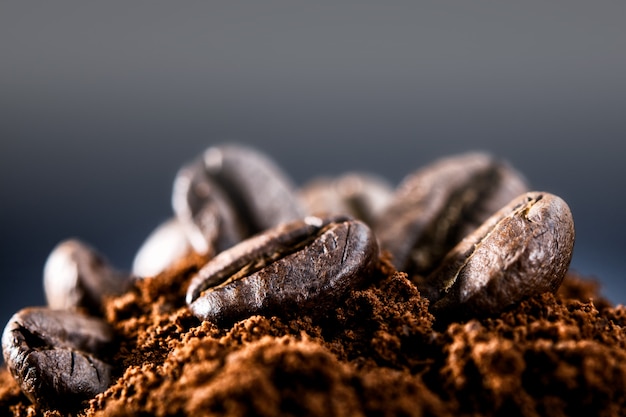 Coffee beans on a dark blue wall