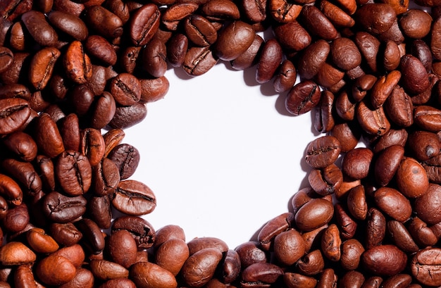 Coffee beans isolated with white table, center circle