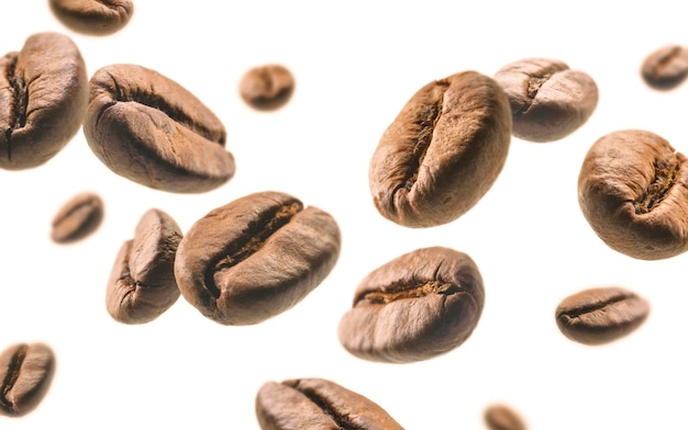 Coffee beans levitate on a white background