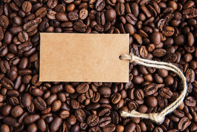 Coffee beans and price tag with copy space