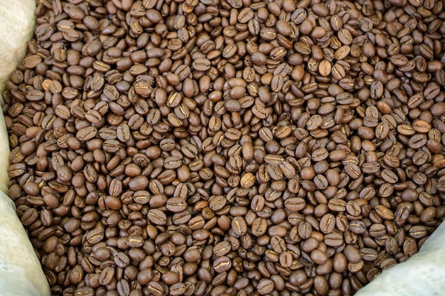 Coffee beans ready for the grinder background